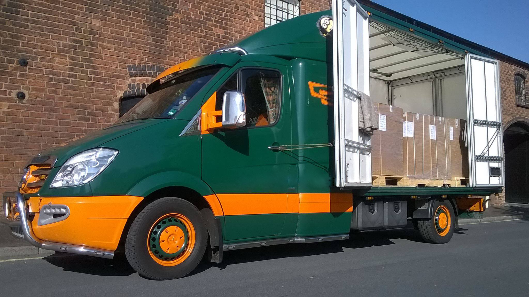 ADR dangerous goods delivery green van with door open